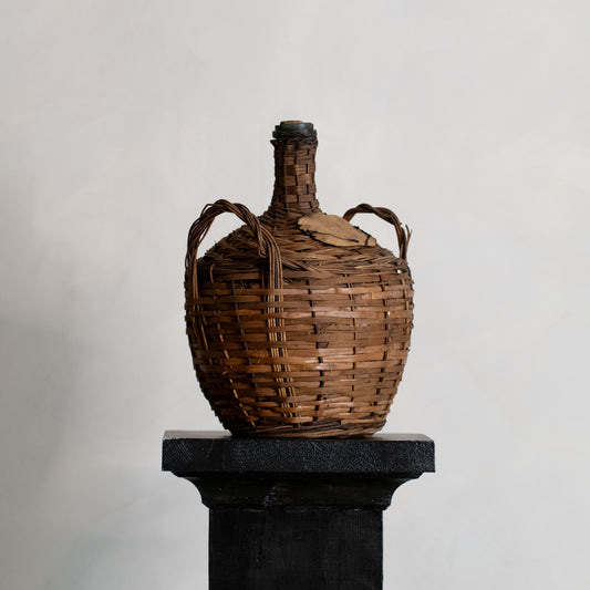 DAMAJUANA DE VIDRIO Y MIMBRE, AÑOS 20