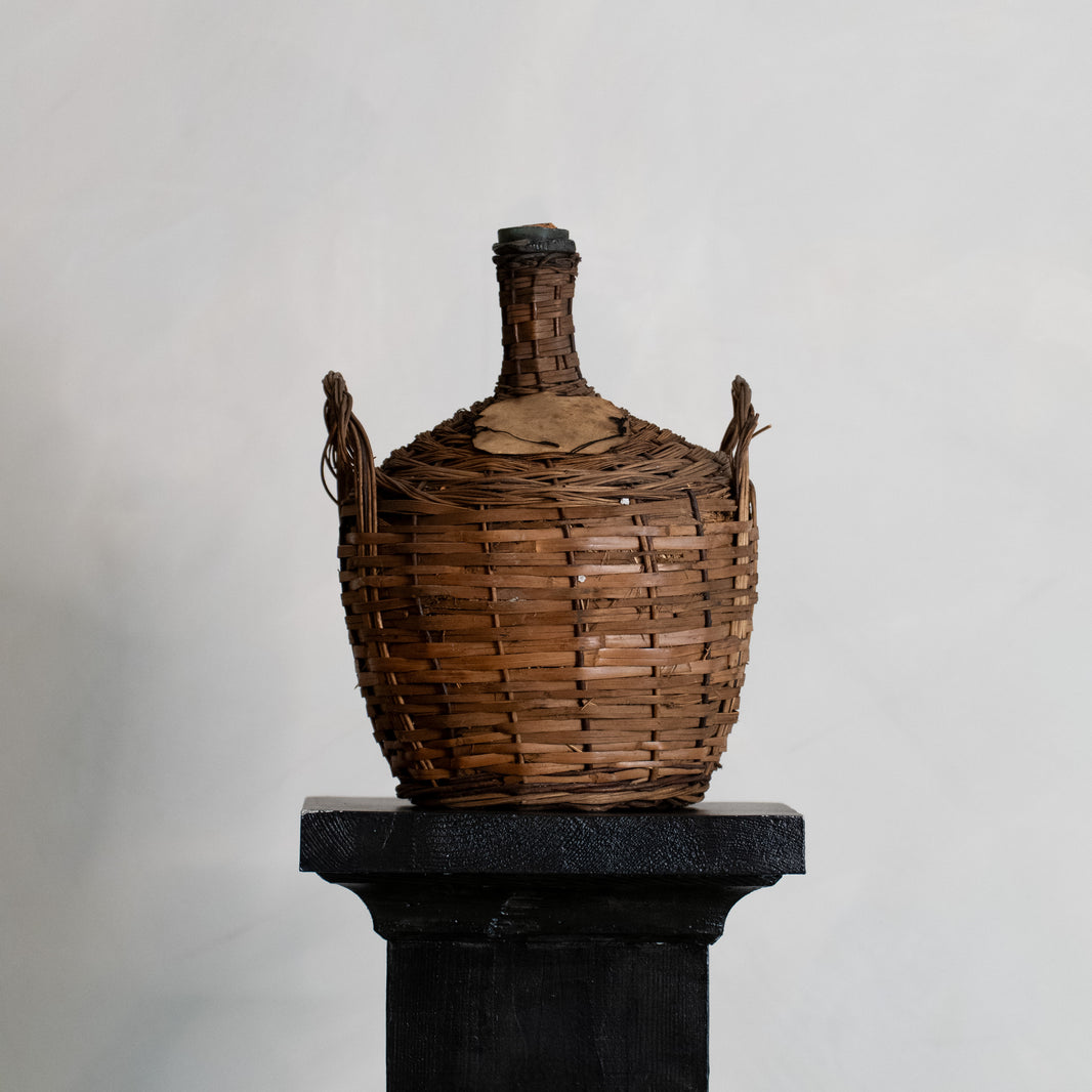 DAMAJUANA DE VIDRIO Y MIMBRE, AÑOS 20